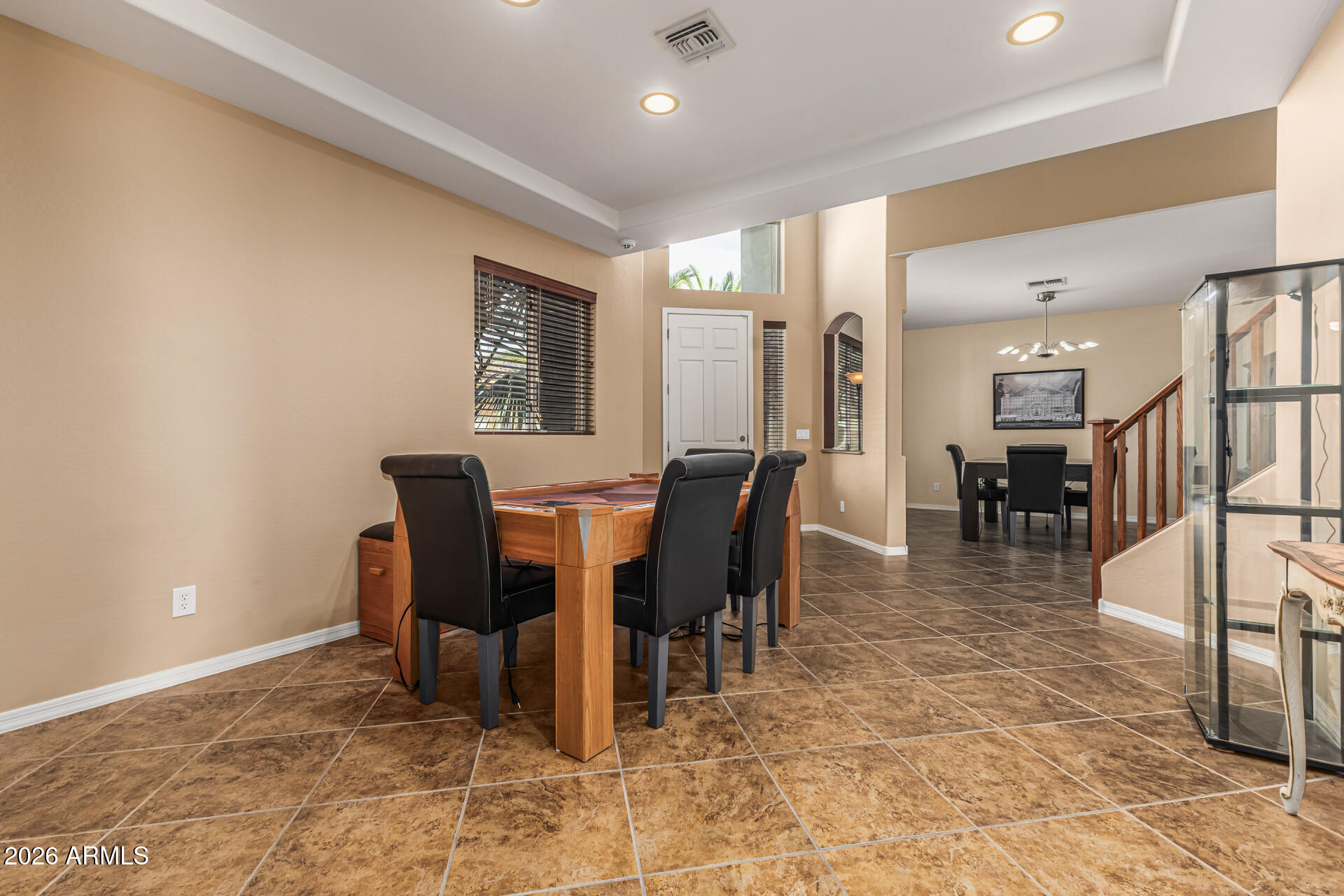 5513 West Rowel Road Phoenix, AZ 85083 - Photo 8 of 55 a view of a dining room with furniture