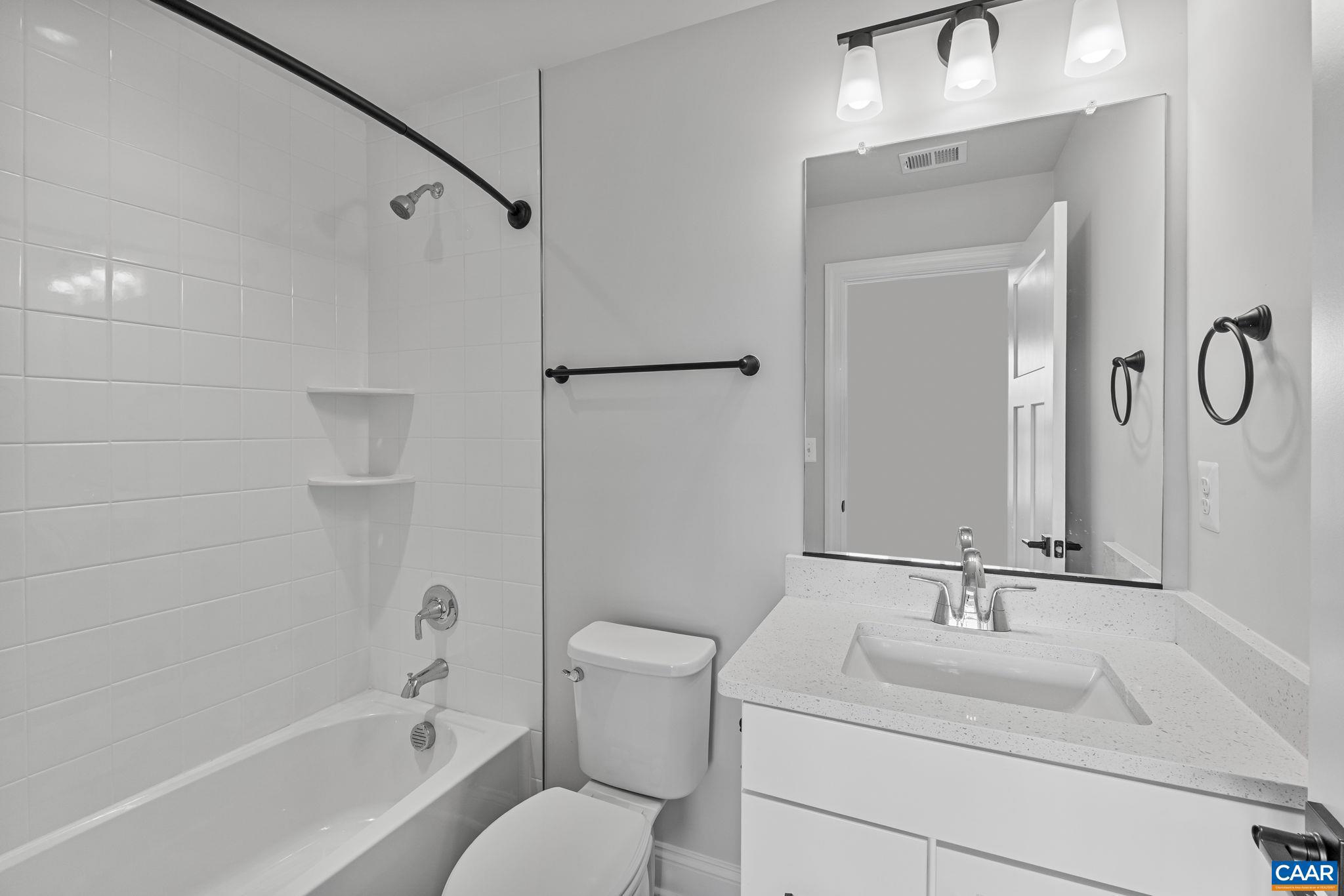 746 Park Ridge Drive Crozet, VA 22932 - Photo 11 of 46 a bathroom with a sink toilet tub and shower