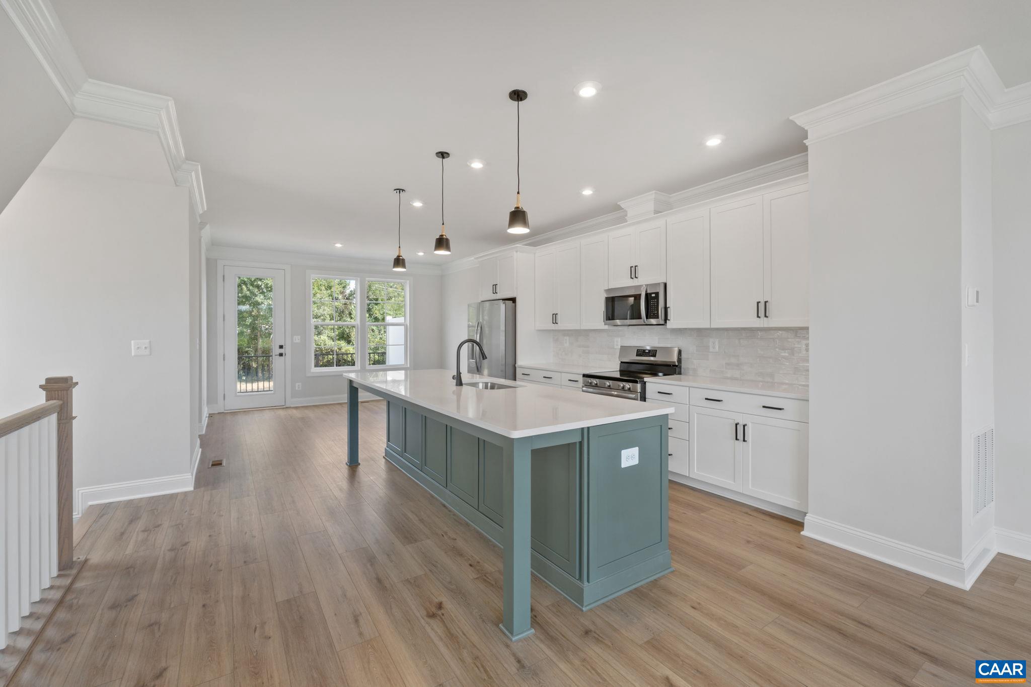746 Park Ridge Drive Crozet, VA 22932 - Photo 12 of 46 a kitchen with a sink window and stainless steel appliances