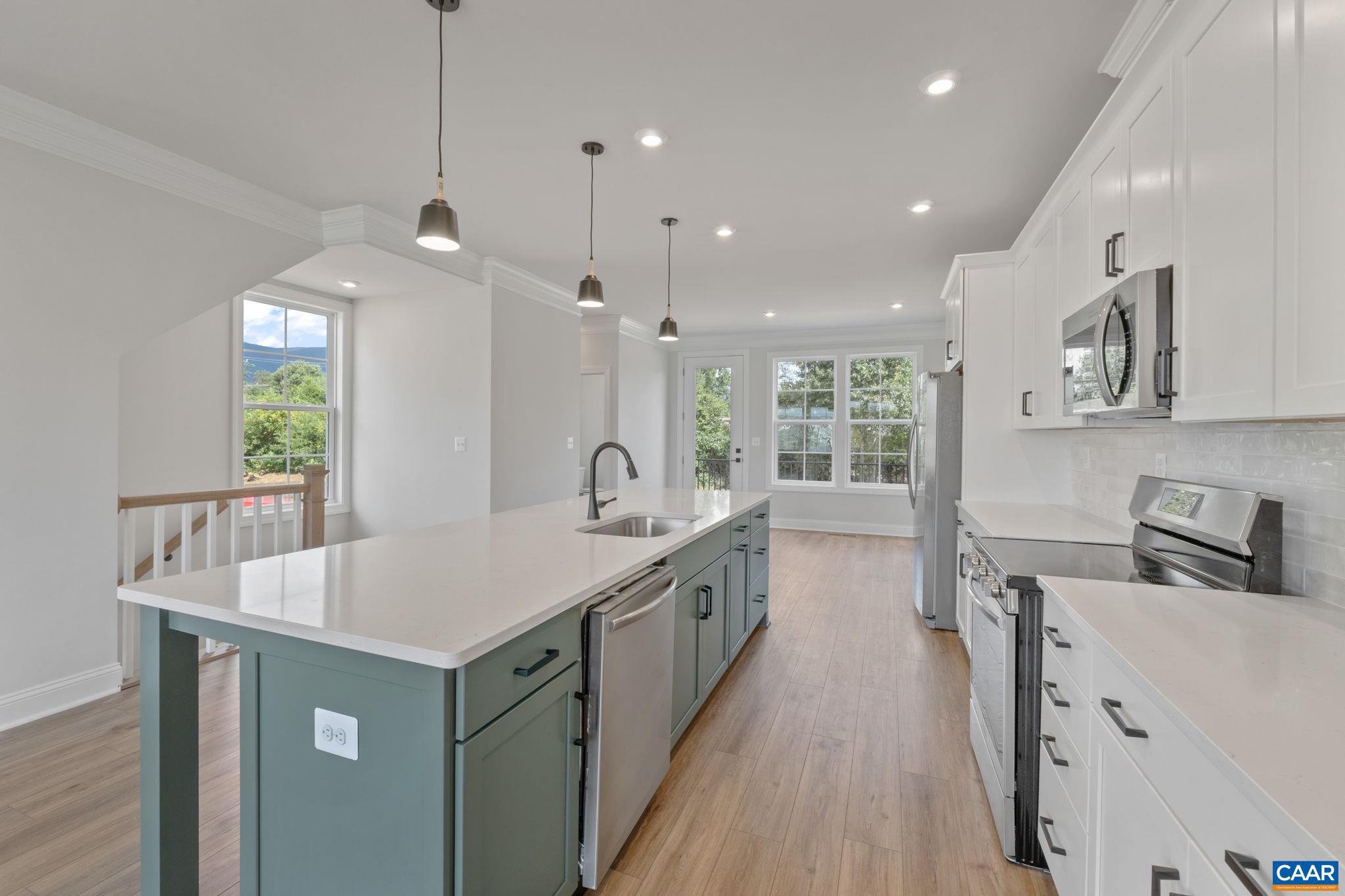 746 Park Ridge Drive Crozet, VA 22932 - Photo 14 of 46 a large kitchen with kitchen island a large island in it