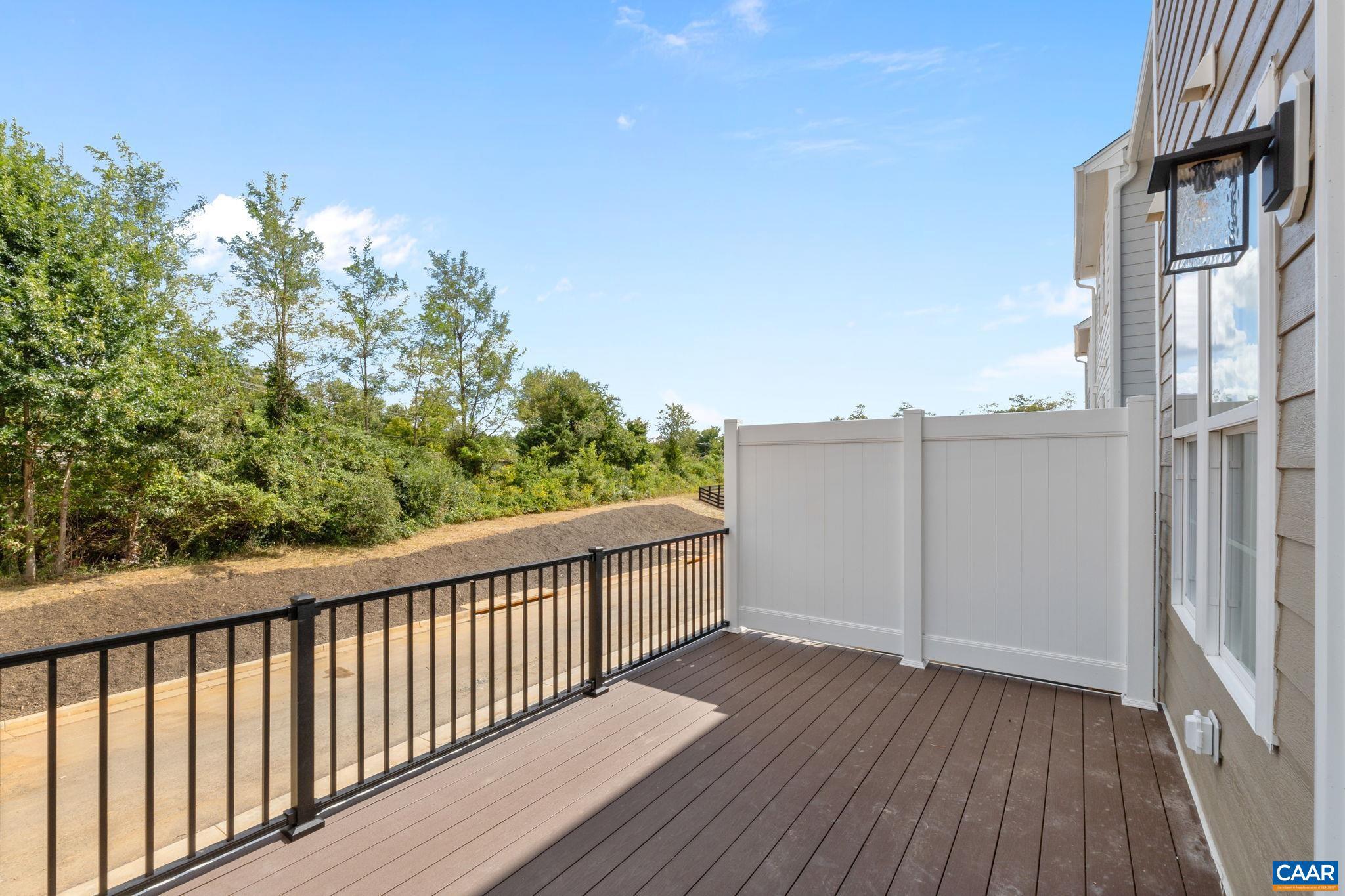 746 Park Ridge Drive Crozet, VA 22932 - Photo 20 of 46 a view of a balcony with wooden floor and fence
