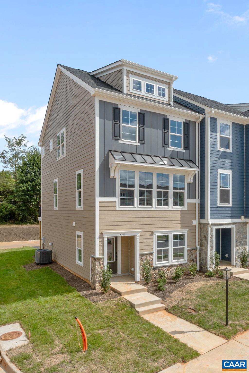 746 Park Ridge Drive Crozet, VA 22932 - Photo 2 of 46 a front view of a house with a yard