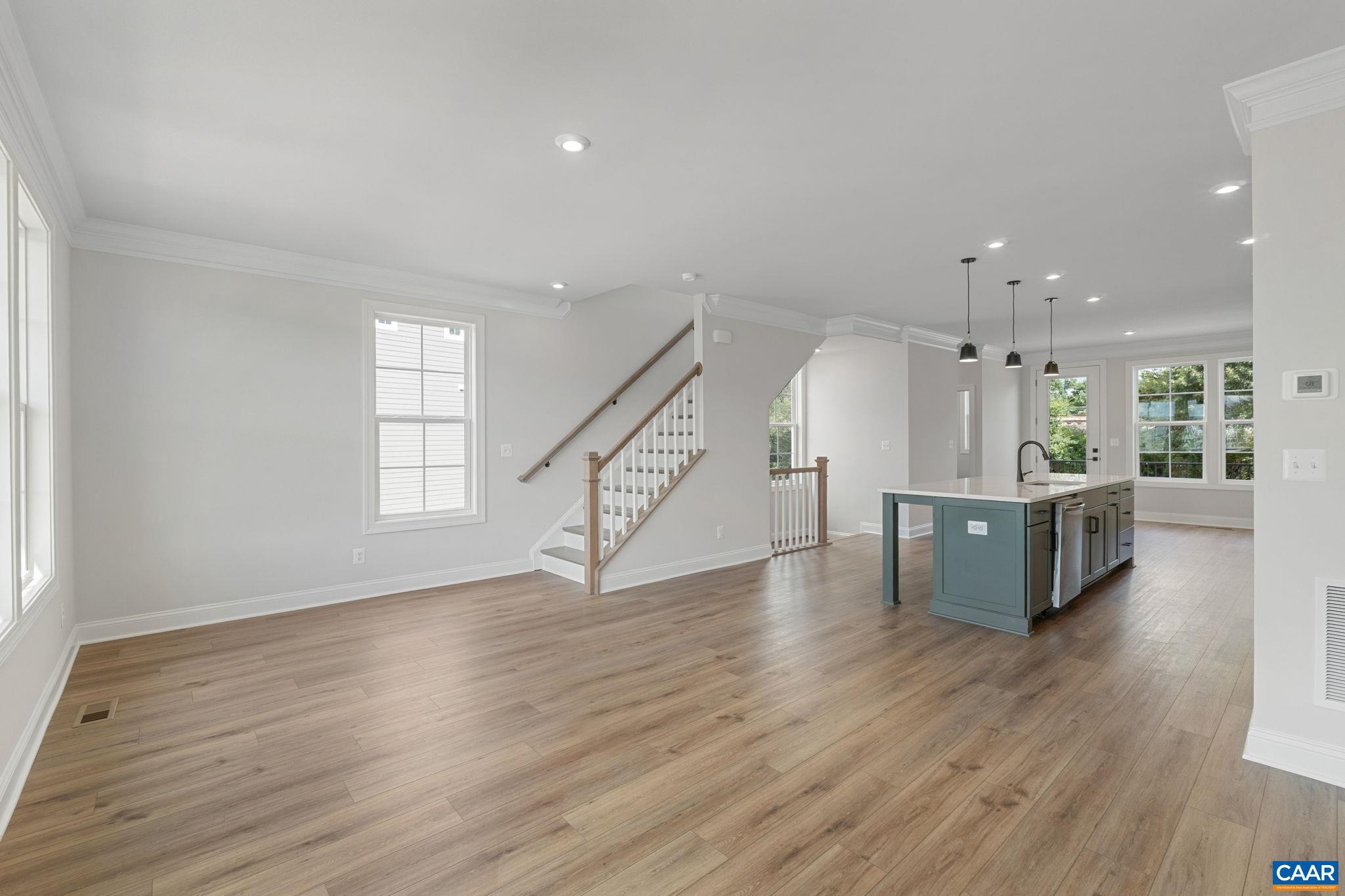 746 Park Ridge Drive Crozet, VA 22932 - Photo 28 of 46 an empty room with wooden floor and windows