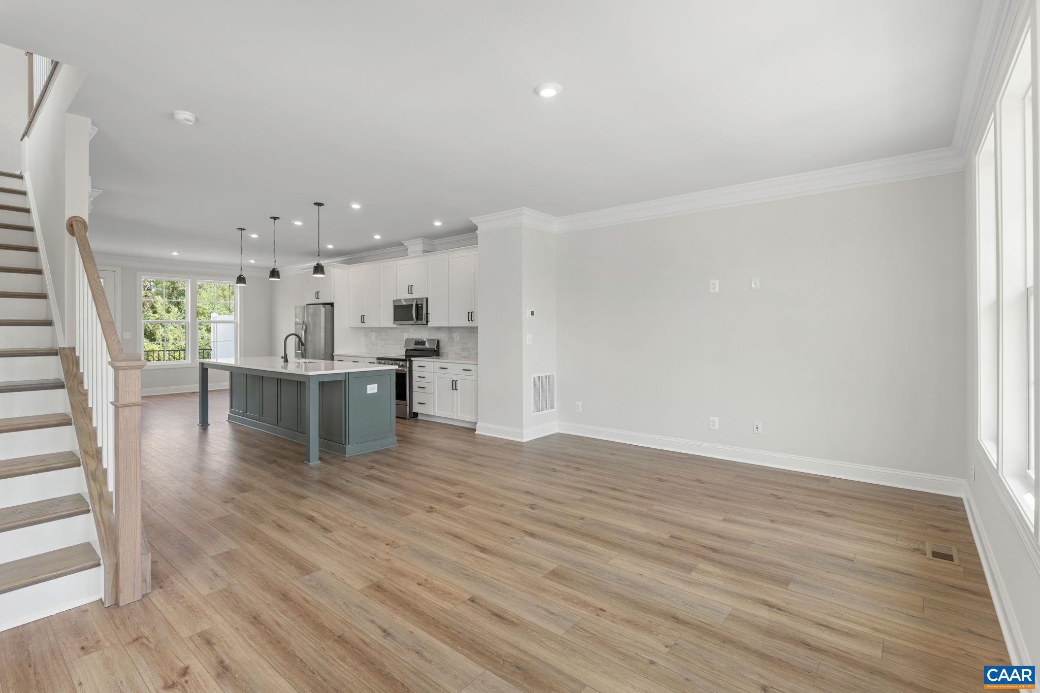 746 Park Ridge Drive Crozet, VA 22932 - Photo 29 of 46 a view of kitchen dining room with wooden floor and kitchen