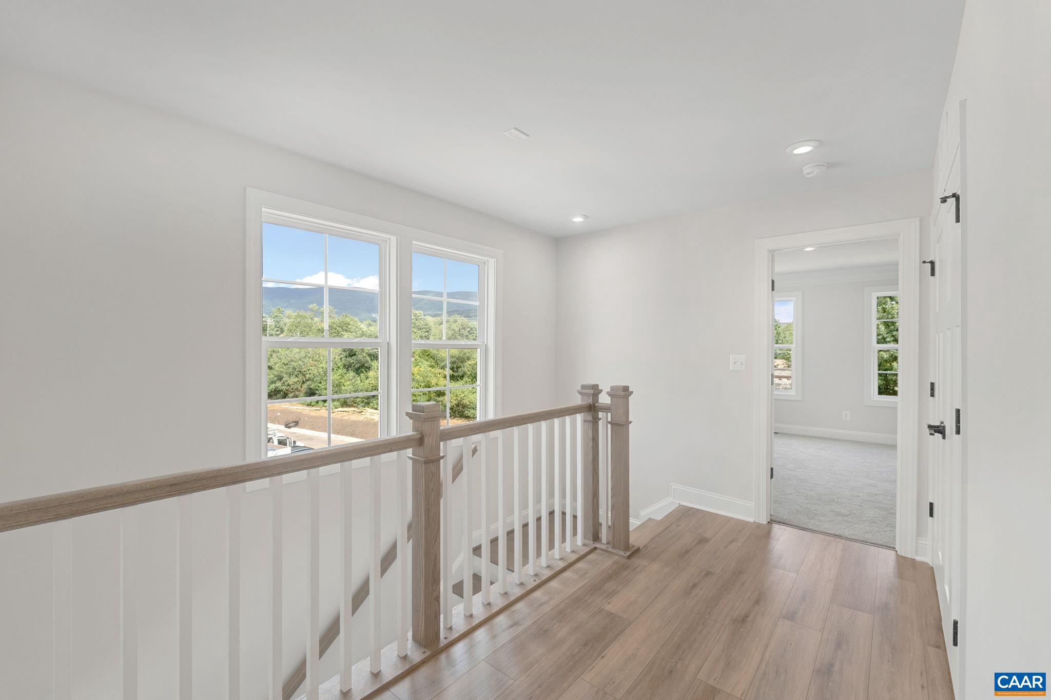 746 Park Ridge Drive Crozet, VA 22932 - Photo 30 of 46 a view of hallway with wooden floor