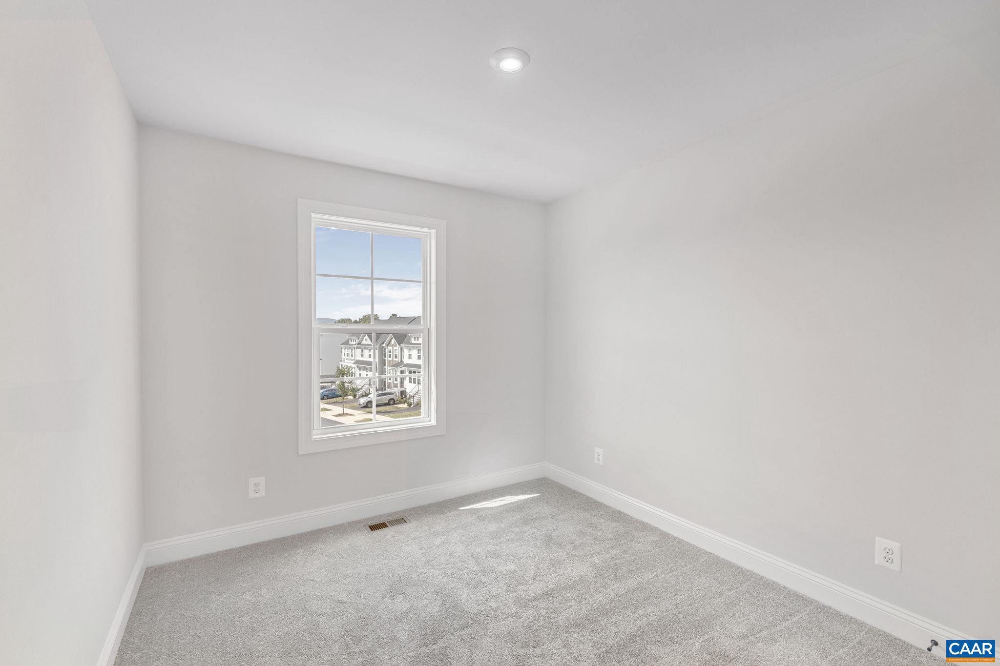 746 Park Ridge Drive Crozet, VA 22932 - Photo 38 of 46 an empty room with a window
