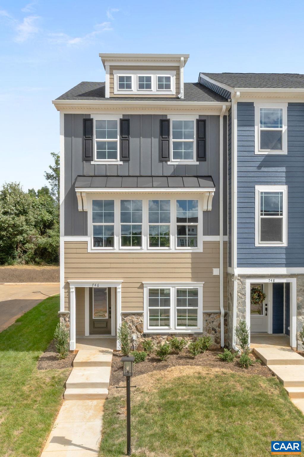 746 Park Ridge Drive Crozet, VA 22932 - Photo 4 of 46 a front view of a house with a yard