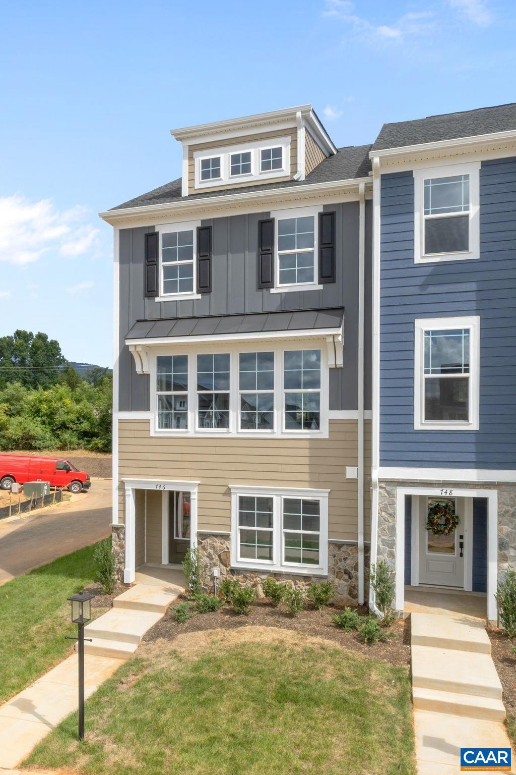 746 Park Ridge Drive Crozet, VA 22932 - Photo 5 of 46 a front view of a house with a yard