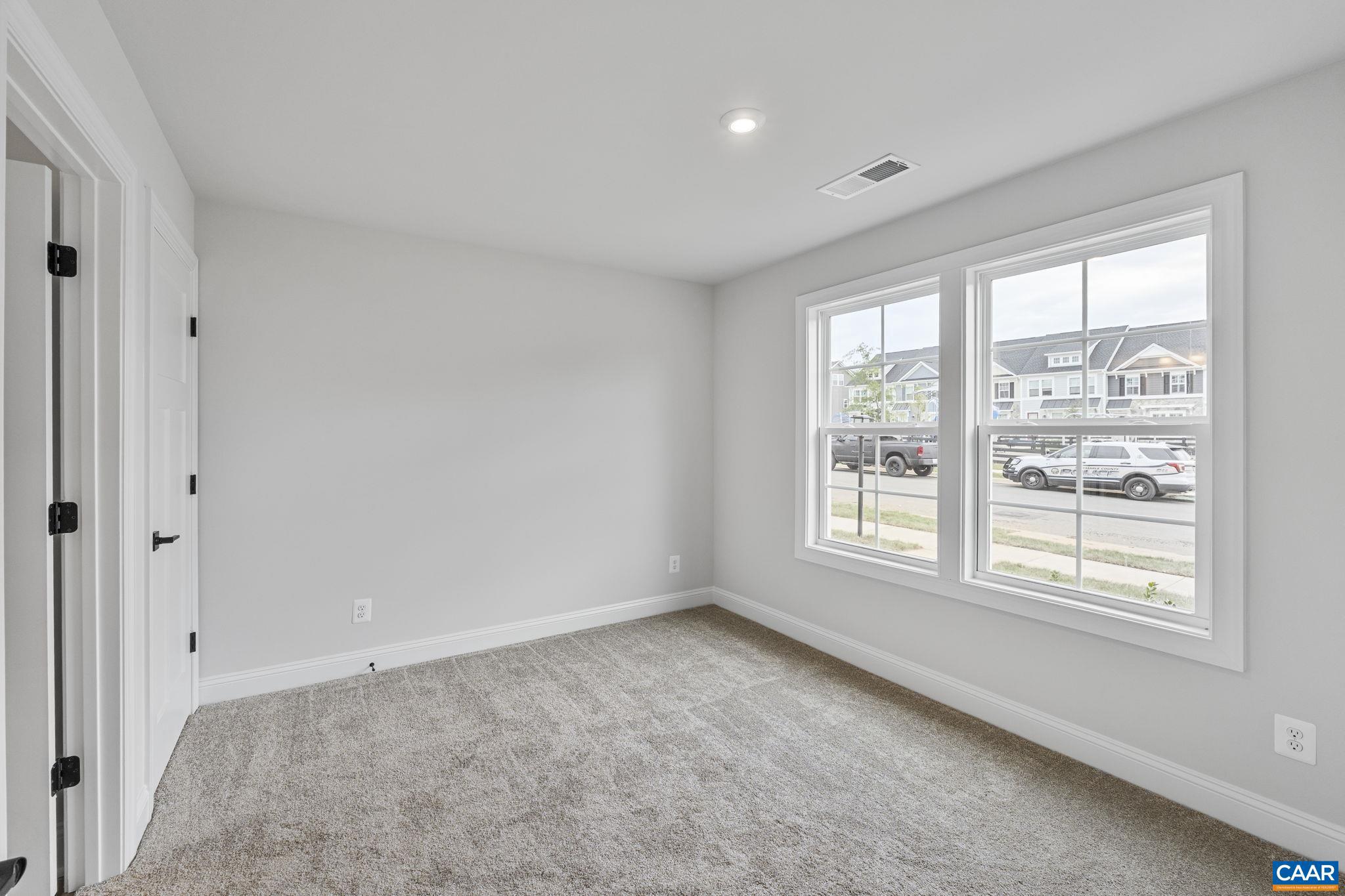 746 Park Ridge Drive Crozet, VA 22932 - Photo 9 of 46 a view of an empty room with a window