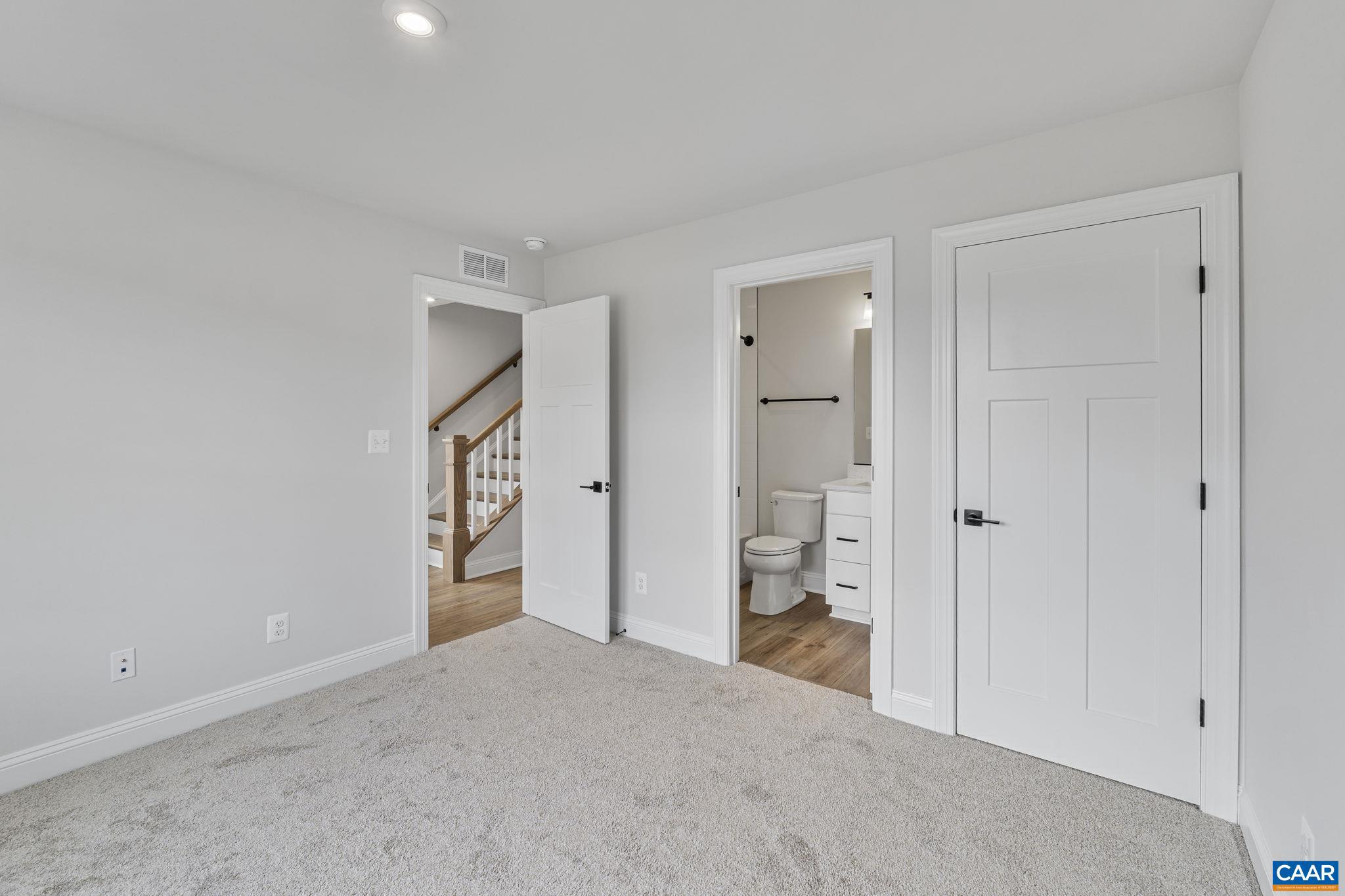 746 Park Ridge Drive Crozet, VA 22932 - Photo 10 of 46 a view of an empty room and a room