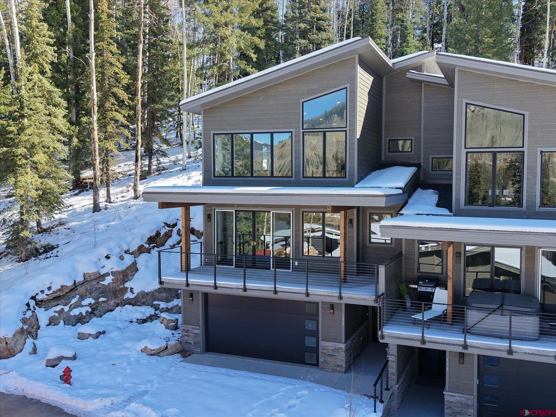 a view of a patio with a table and chairs