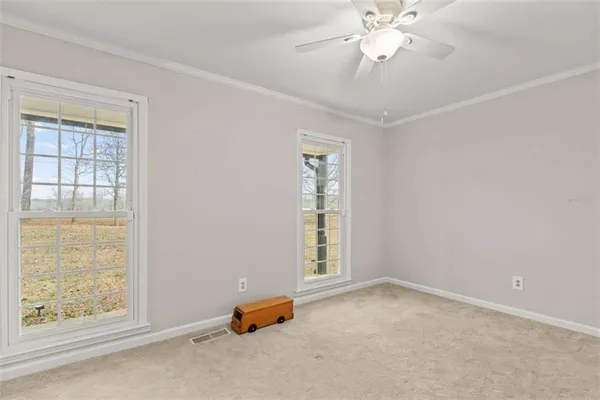 a bathroom with a toilet and a sink