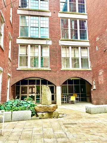 a view of a balcony with window