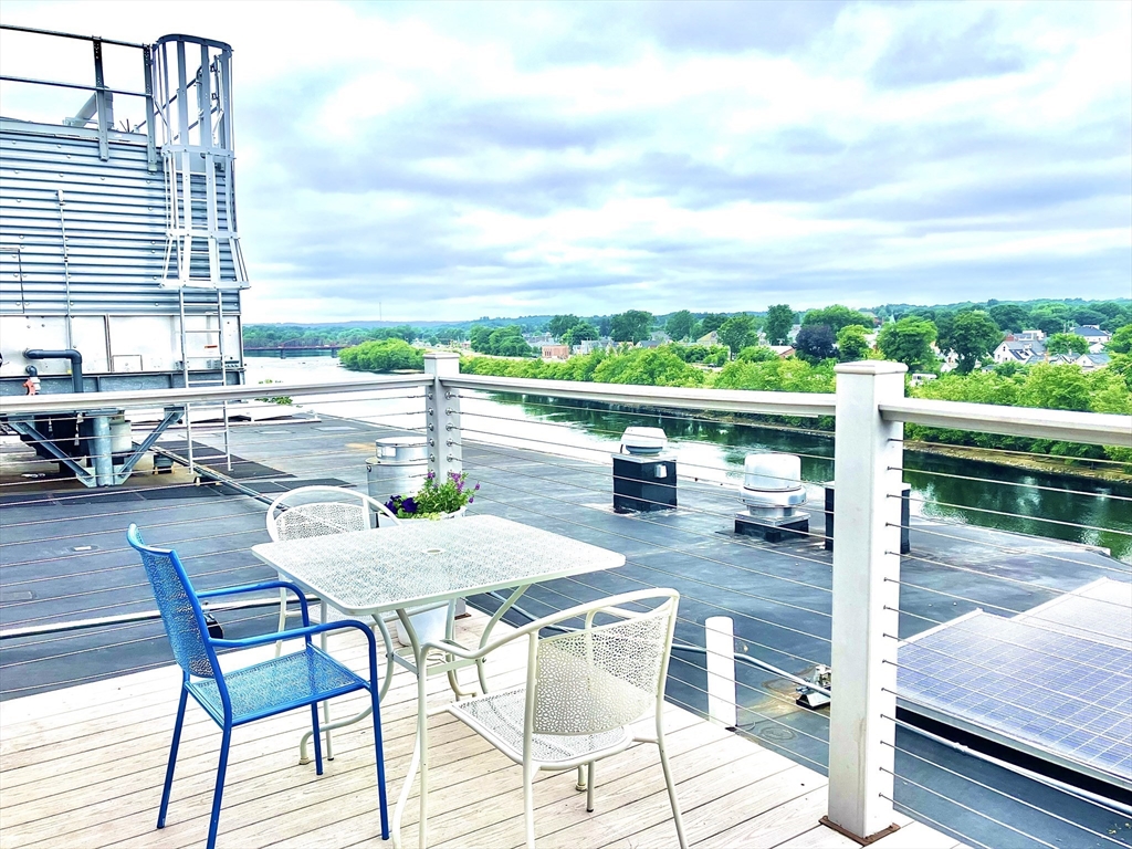 130 John Street, Unit G01 Lowell, MA 01852 - Photo 28 of 40 a outdoor view with a sitting space