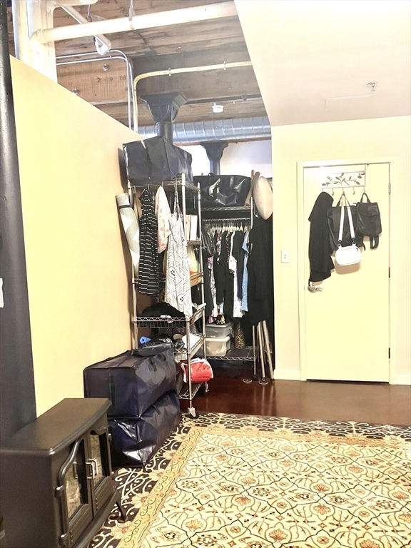 130 John Street, Unit G01 Lowell, MA 01852 - Photo 40 of 40 a view of a living room with gym equipment