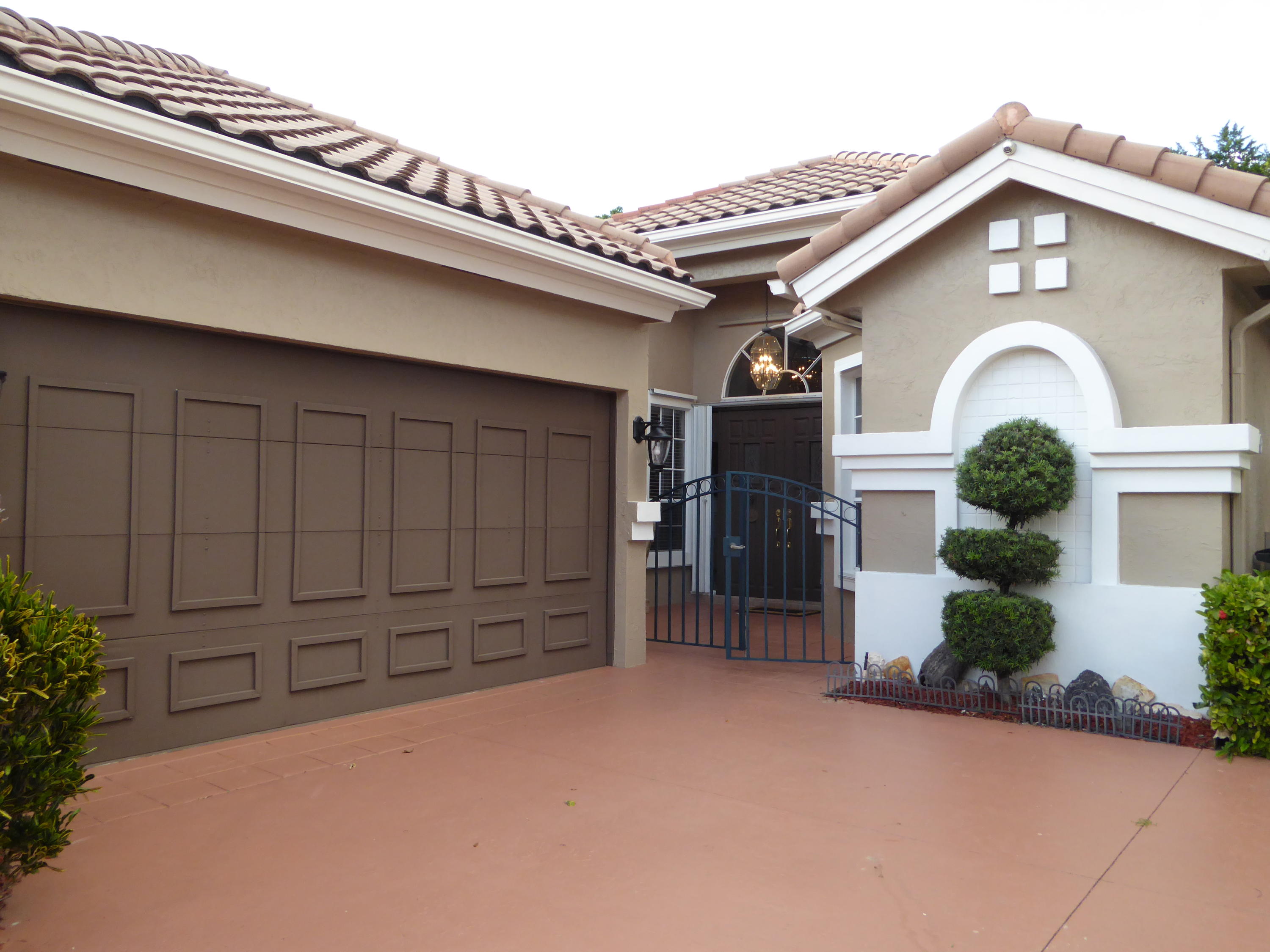 6383 Northwest 24th Street Boca Raton, FL 33434 - Photo 2 of 26 Front of Home