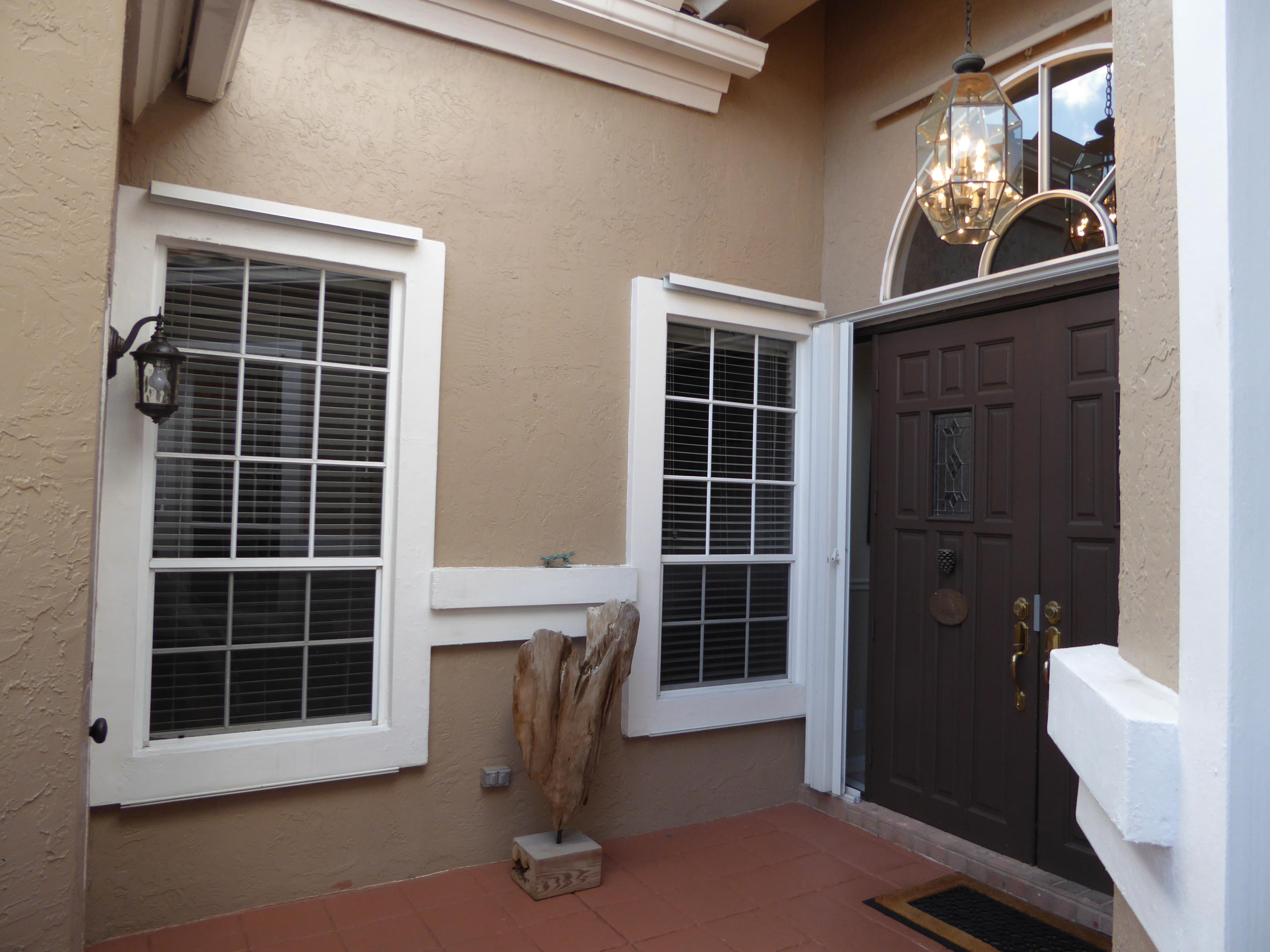 6383 Northwest 24th Street Boca Raton, FL 33434 - Photo 3 of 26 Front Entrance - Courtyard Area