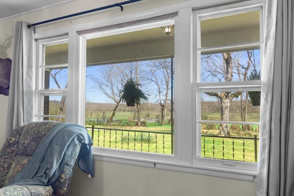 a kitchen with a cabinets and window
