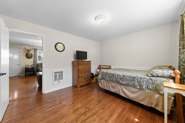 a view of a bedroom from a hallway