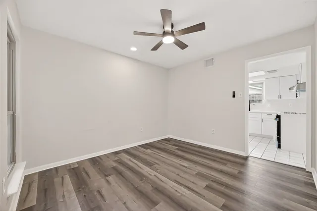 a view of an empty room and window