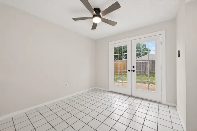 a kitchen with stainless steel appliances granite countertop a sink and a stove