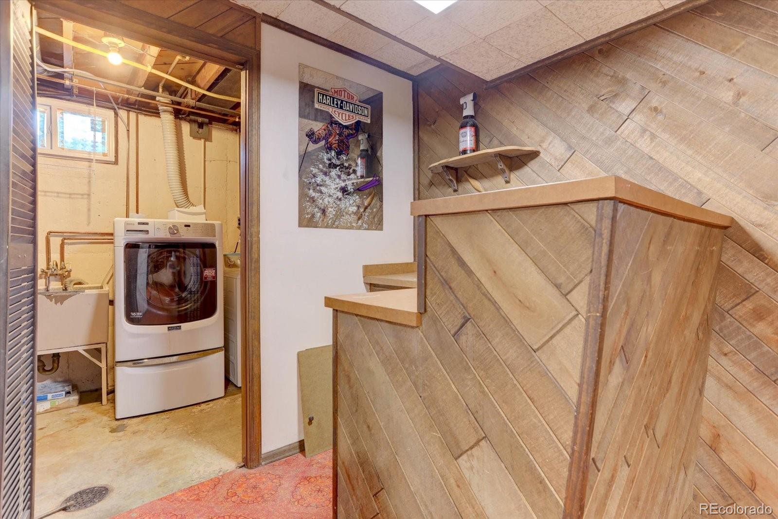 7141 Raritan Street Denver, CO 80221 - Photo 17 of 29 a utility room with dryer and washer