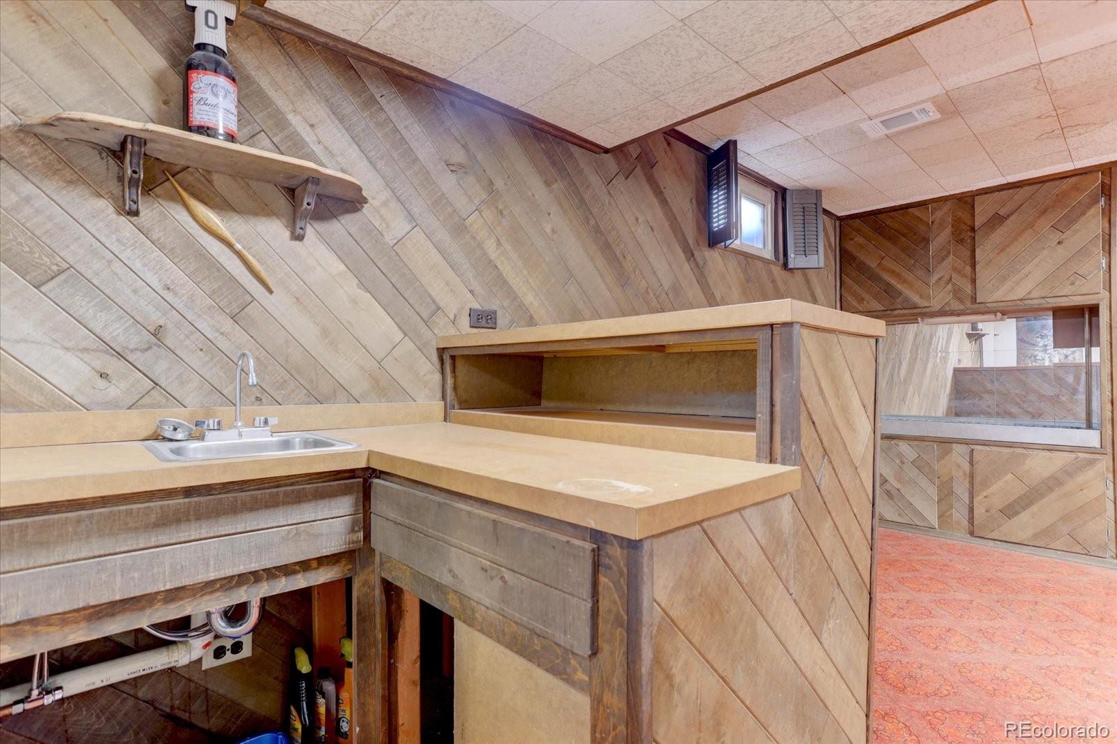 7141 Raritan Street Denver, CO 80221 - Photo 18 of 29 a utility room with dryer and washer