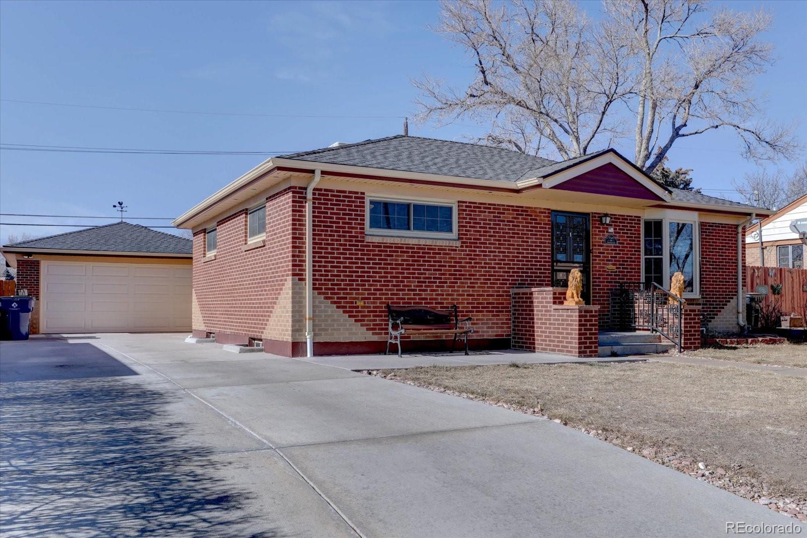 7141 Raritan Street Denver, CO 80221 - Photo 2 of 29 a view of a house with a patio