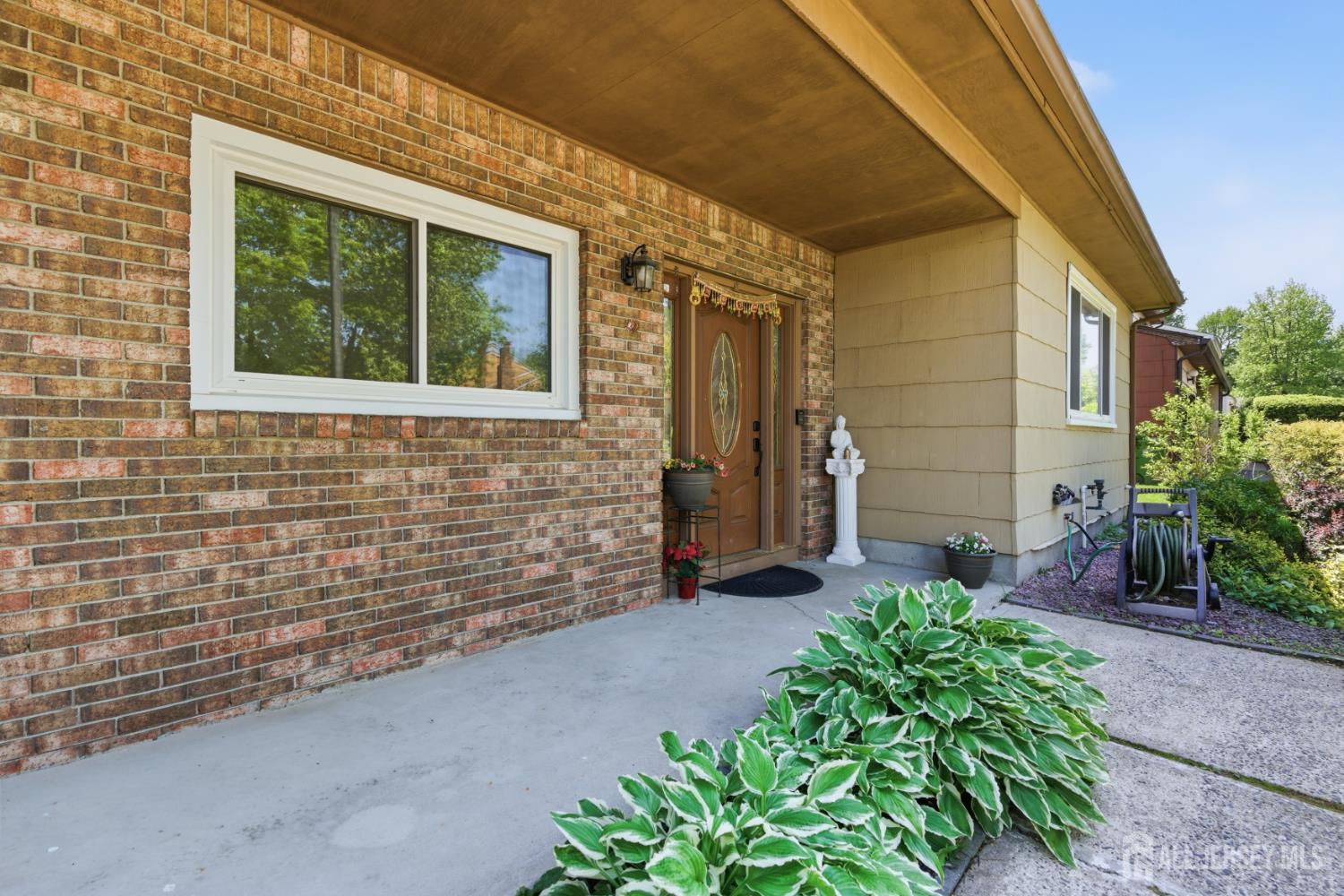 213 Normandy Road Edison, NJ 08820 - Photo 5 of 45 a view of house with backyard