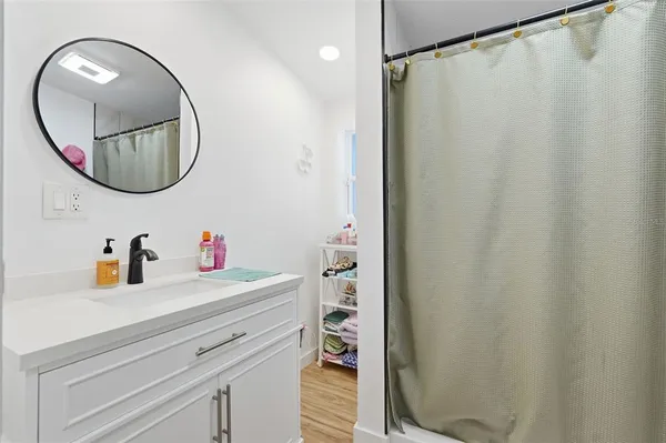 a swimming pool with outdoor seating and yard