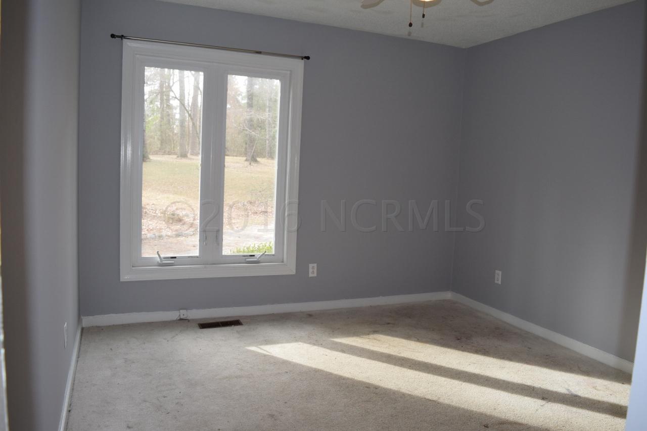 1998 Hoods Creek Road New Bern, NC 28562 - Photo 11 of 22 Spacious Guest Room