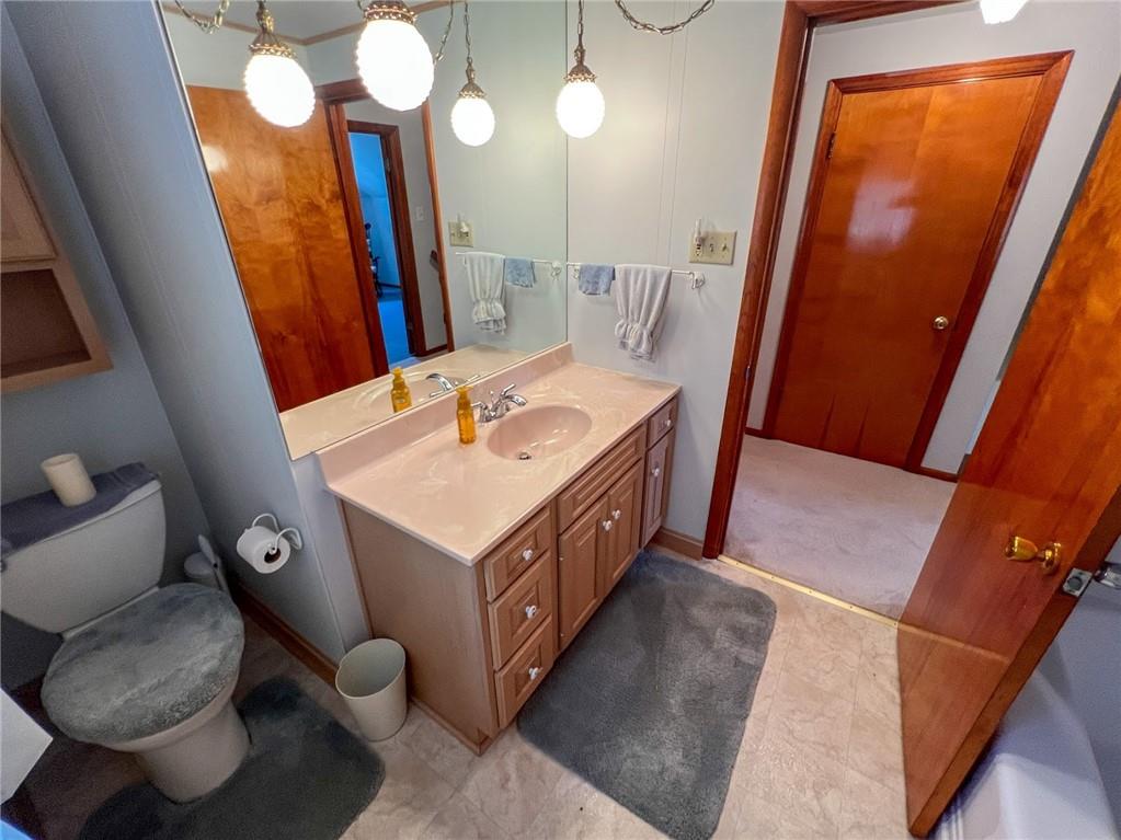 201 Beech Road Butler, PA 16001 - Photo 12 of 49 a bathroom with a sink vanity and mirror