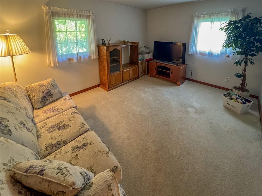 201 Beech Road Butler, PA 16001 - Photo 19 of 49 a living room with furniture and a flat screen tv