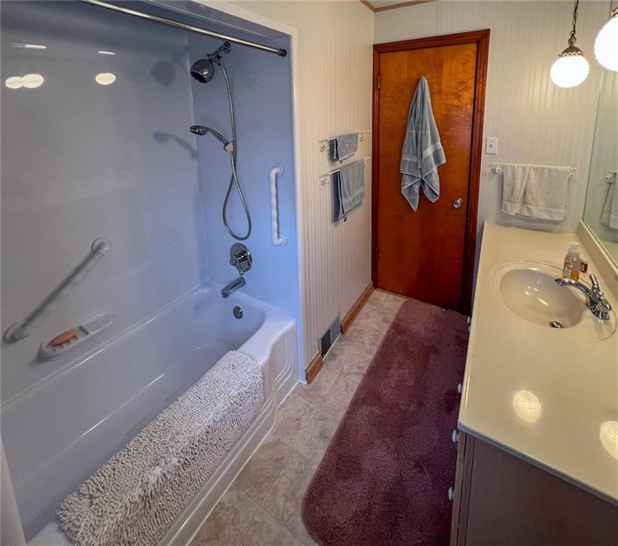 201 Beech Road Butler, PA 16001 - Photo 28 of 49 a bathroom with a tub and a shower