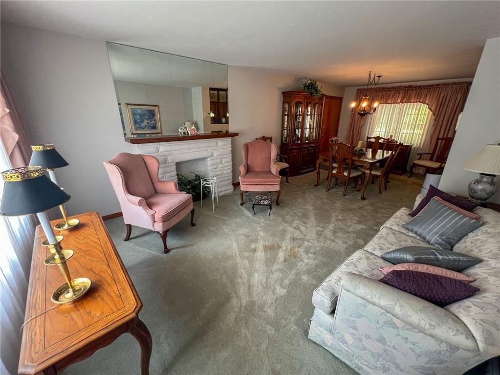 201 Beech Road Butler, PA 16001 - Photo 29 of 49 a living room with furniture and a wooden floor