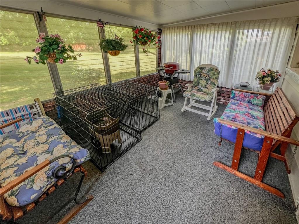201 Beech Road Butler, PA 16001 - Photo 39 of 49 a room with furniture and a large window