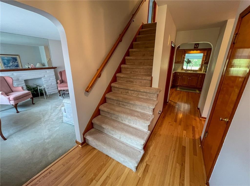 201 Beech Road Butler, PA 16001 - Photo 6 of 49 a view of entryway and hall with wooden floor