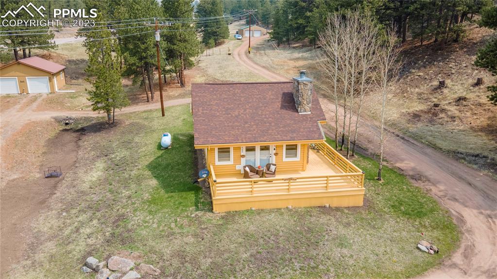 93 Water Street Guffey, CO 80820 - Photo 18 of 23 a aerial view of a house with a yard