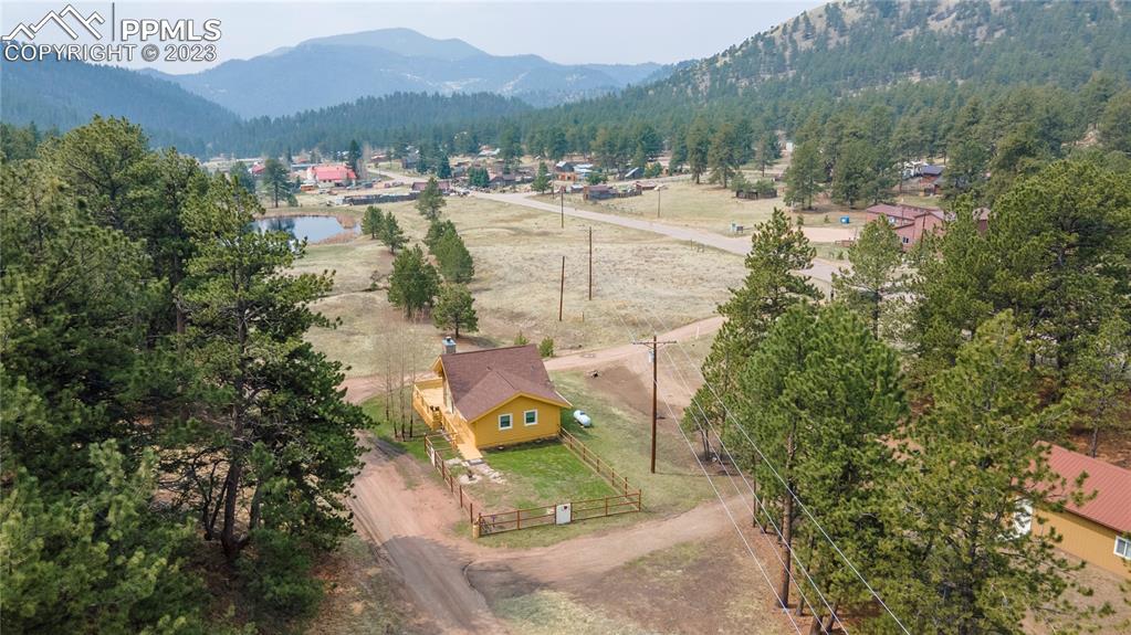 93 Water Street Guffey, CO 80820 - Photo 19 of 23 a view of a town with mountains in the background