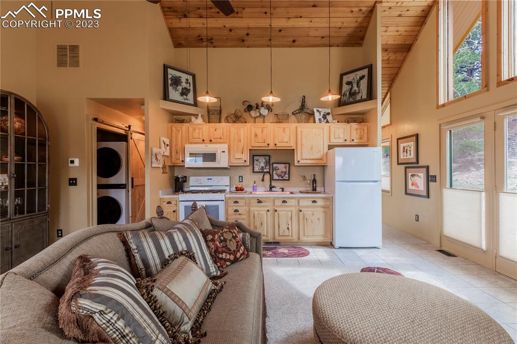 93 Water Street Guffey, CO 80820 - Photo 5 of 23 a view of a livingroom with furniture and a kitchen