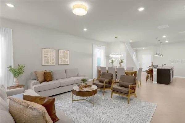 a living room with furniture and a couch