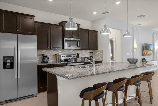 $885,000 | 1261 Emerald Row Way, Clermont, FL 34714