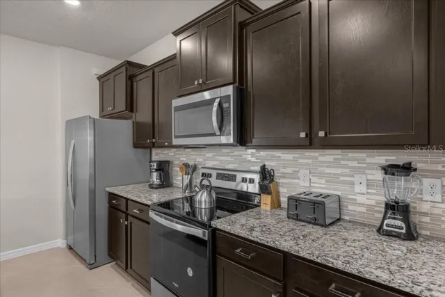 $885,000 | 1261 Emerald Row Way, Clermont, FL 34714