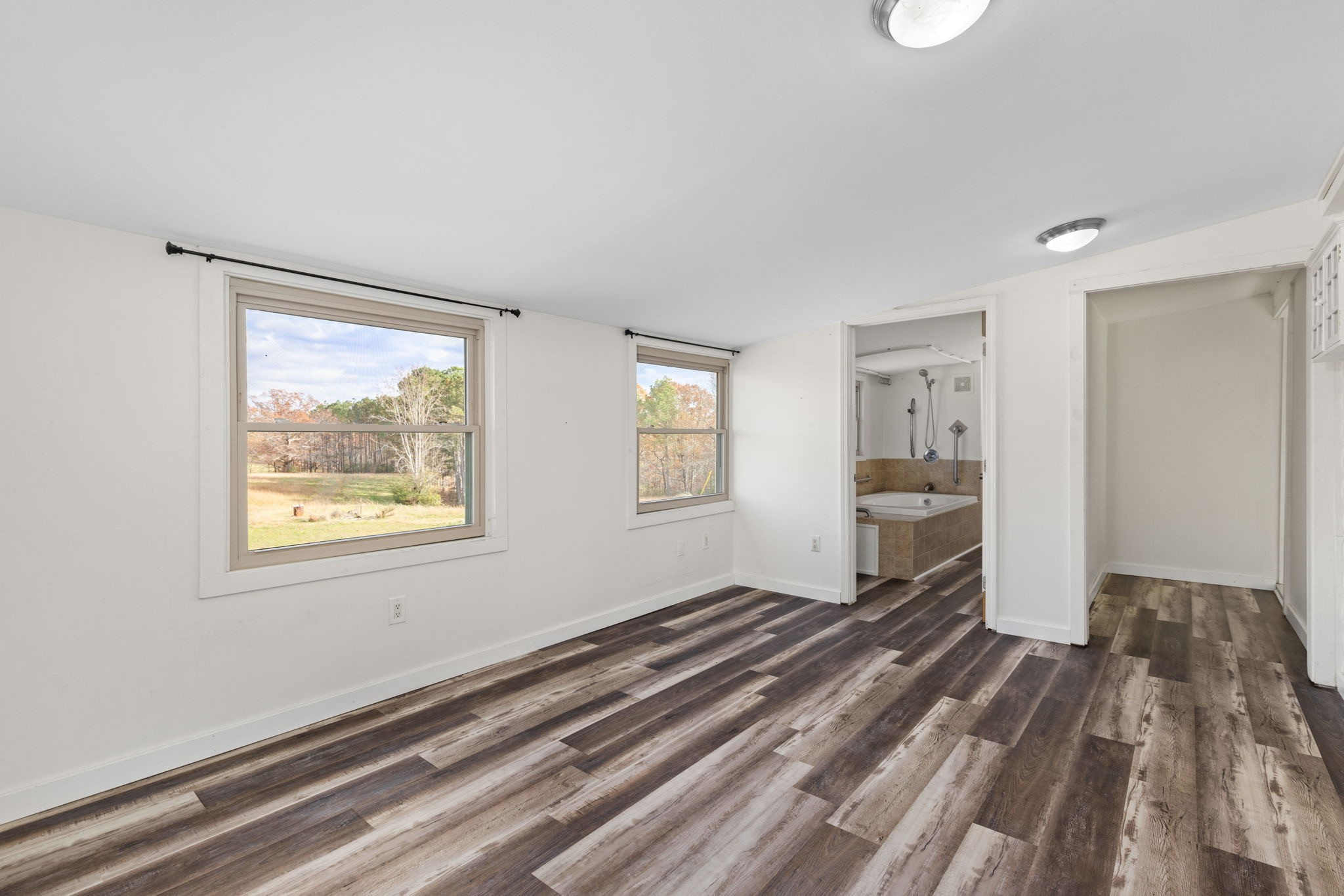 9680 Buttermilk Ridge Road Lawrenceburg, TN 38464 - Photo 18 of 61 a bedroom with a bed and a window