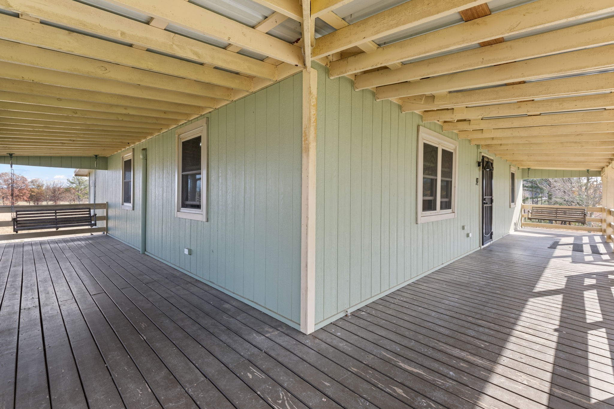 9680 Buttermilk Ridge Road Lawrenceburg, TN 38464 - Photo 31 of 61 a view of a porch with wooden floor
