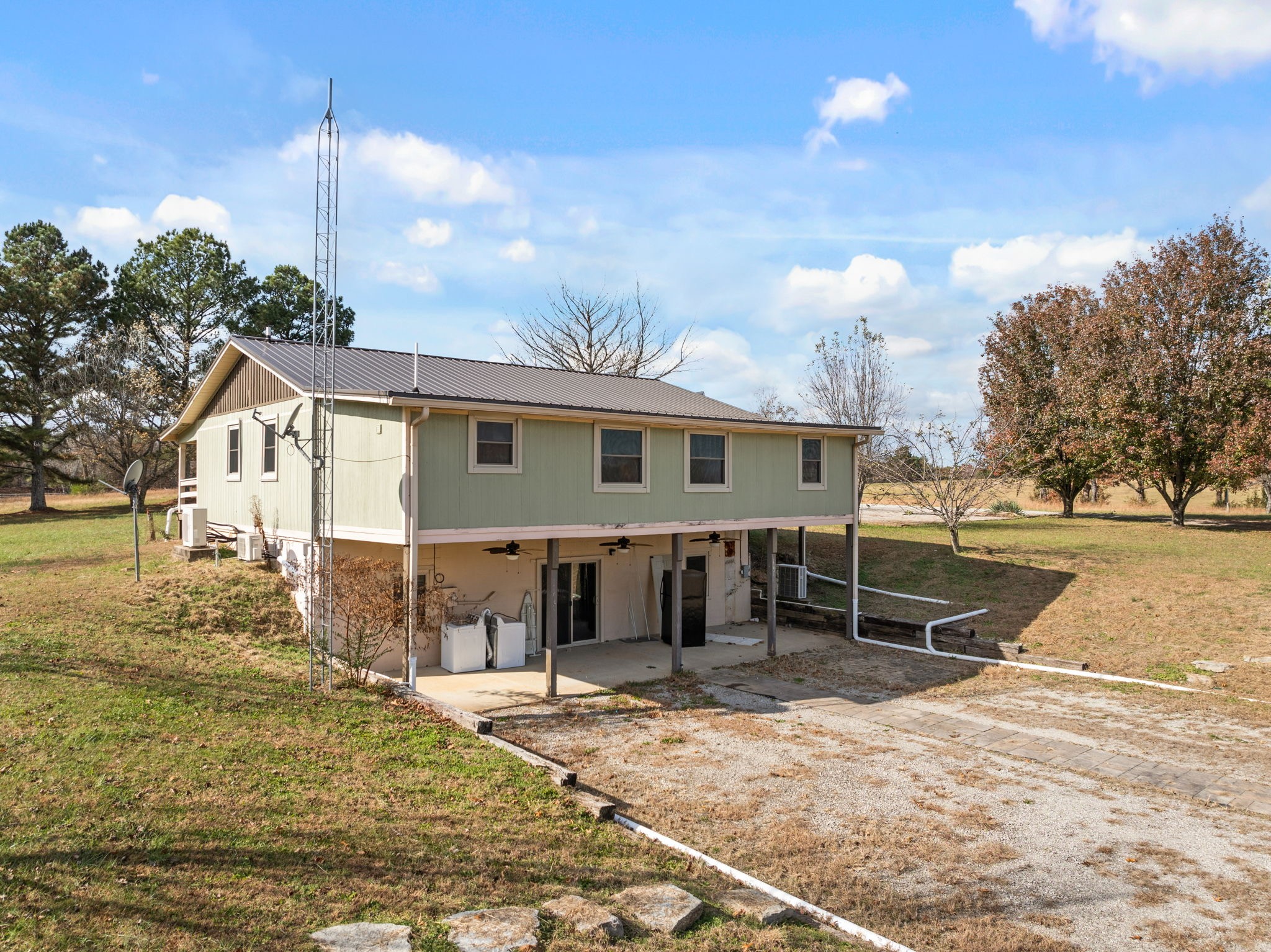 9680 Buttermilk Ridge Road Lawrenceburg, TN 38464 - Photo 56 of 61 a front view of a house with a yard