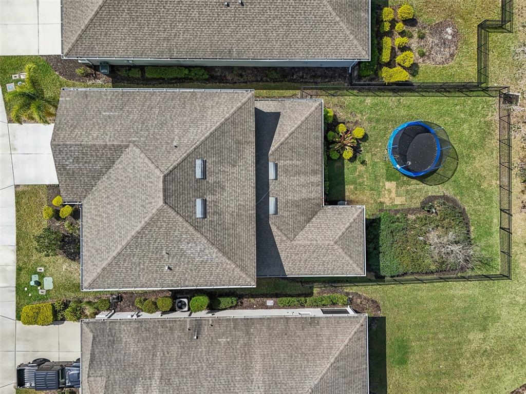 4515 Bent Tree Boulevard Sarasota, FL 34241 - Photo 31 of 34 an aerial view of a house with garden space and swimming pool