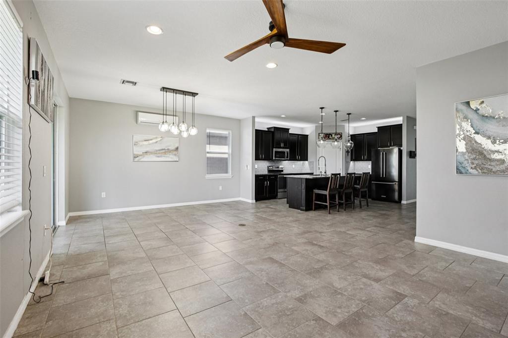 4515 Bent Tree Boulevard Sarasota, FL 34241 - Photo 5 of 34 a view of a workspace with furniture and a kitchen