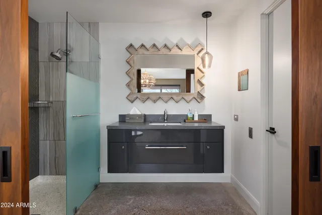 a view of a swimming pool with a lounge chairs