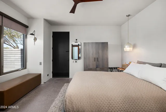 a view of a terrace with a table and chairs